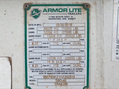 Armor Lite Trailers data plate showing GVWR 34020 kg, GAWR front 10206 kg, GAWR rear 10206 kg, tire 8.25 RIMS 110 psi cold, VIN 56EA53K21HA000310, model SBD-40