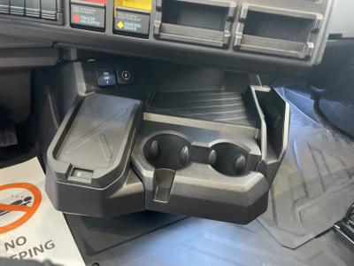 Mack PR64T76H interior center console with cup holders and storage compartments shown.