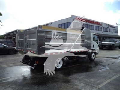Isuzu NPR XD truck with dumping bed, side view showing cargo bed and rear bumper.