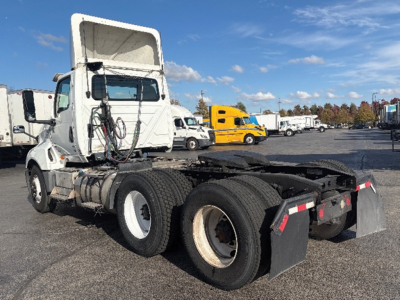 2019 International LT625 cab and chassis showing rear view with fifth wheel and dual rear axles.
