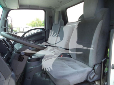 Isuzu NPRR truck interior showing driver and front passenger seats with gray fabric in a box truck cab.