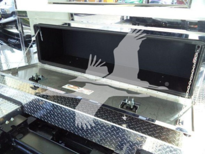 Kenworth T280 rollback truck interior toolbox with diamond plate metal and open chest showing storage compartment and metal steps.