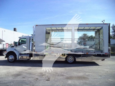 Kenworth T280 rollback truck side view showing empty cargo box with cab, VIN 2NK3HM6X6SM140656 and stock number J40656.