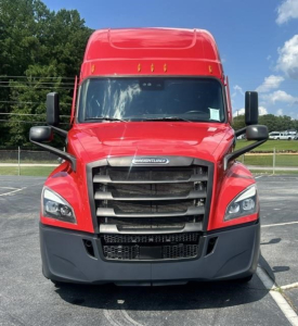 Front view of a red Freightliner Cascadia 126 truck showing front grille, headlights, hood, and mirrors.