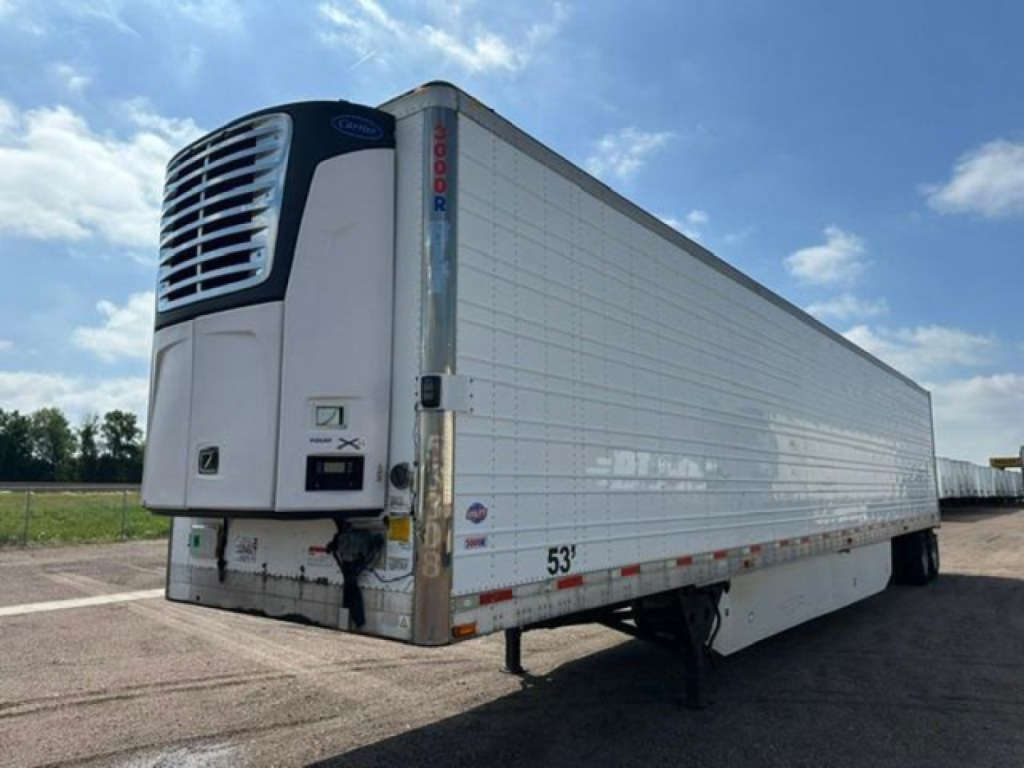 Trailer refrigeration unit with front refrigeration box and white panels showing 53' length and freezer unit.