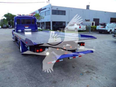 Tow truck rollback flatbed with blue finish, rear view showing hydraulic bed and tail lights, Peterbilt 536 stock BLUE536STEPSIDE.