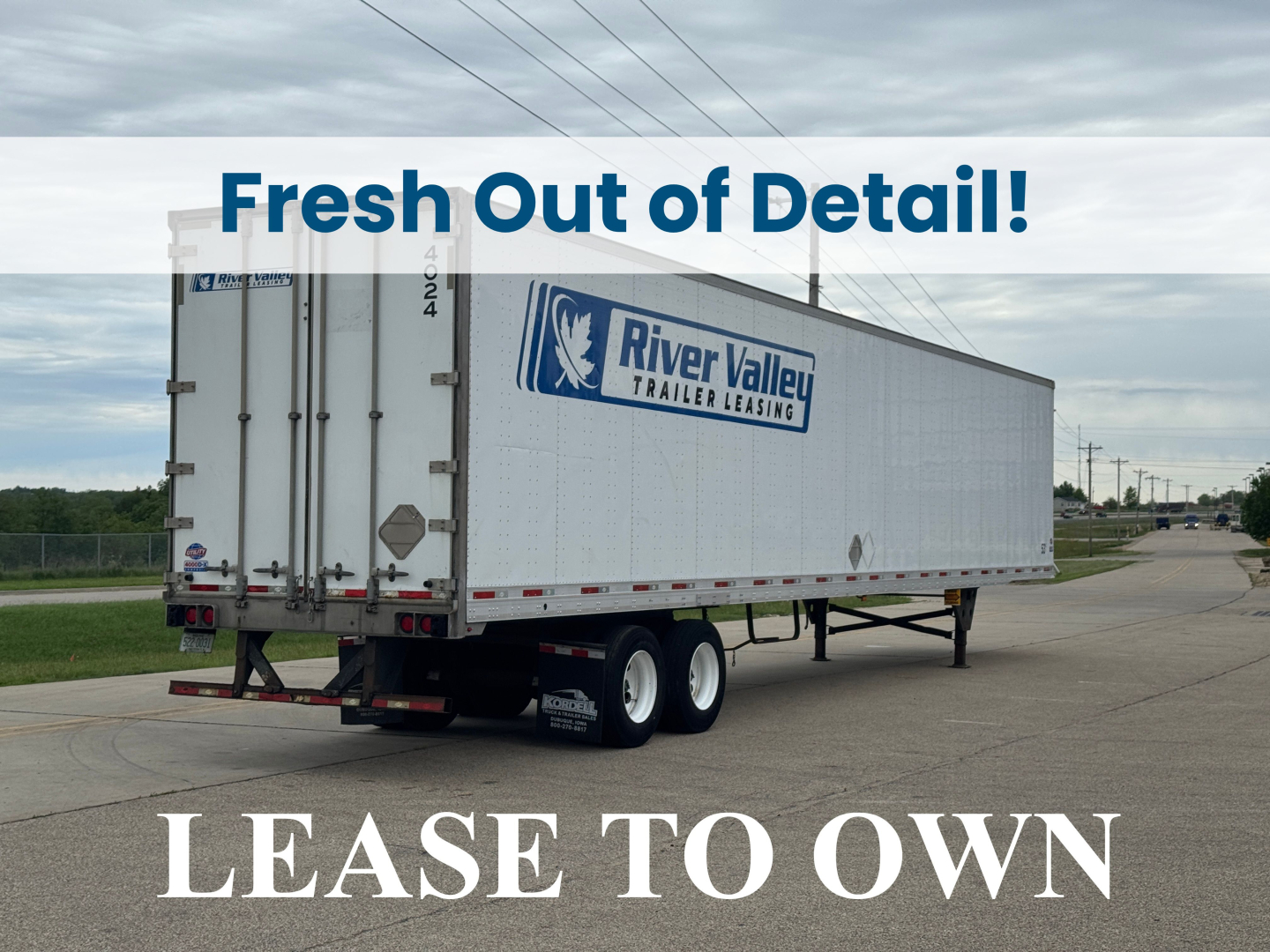 Utility trailer showing River Valley Trailers Leasing logo and LEASE TO OWN banner on side with fresh out of detail overlay.