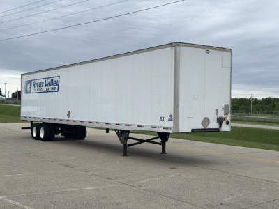 Utility 4000Dx trailer in side view showing River Valley trailer leasing branding on white cargo box with dual rear doors and landing gear.
