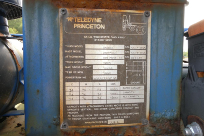 Teledyne Princeton truck lifting equipment identification plate with model and weight specs; text includes Teledyne Princeton, CANAL WINCHESTER OH 43110, S.N., truck model, max gross weight, rated capacity.