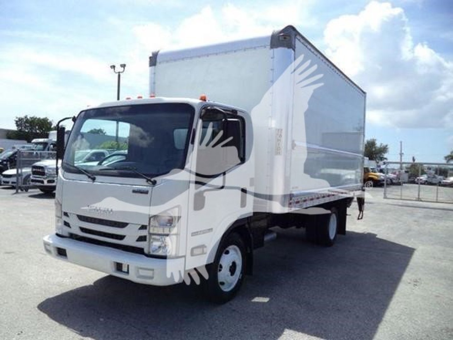Isuzu NPR HD box truck showing cab and box with front grille and headlights visible.