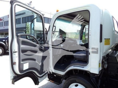 Isuzu NPR-HD truck cab interior with open door showing steering wheel and dashboard; white exterior, stock image of a used box truck.