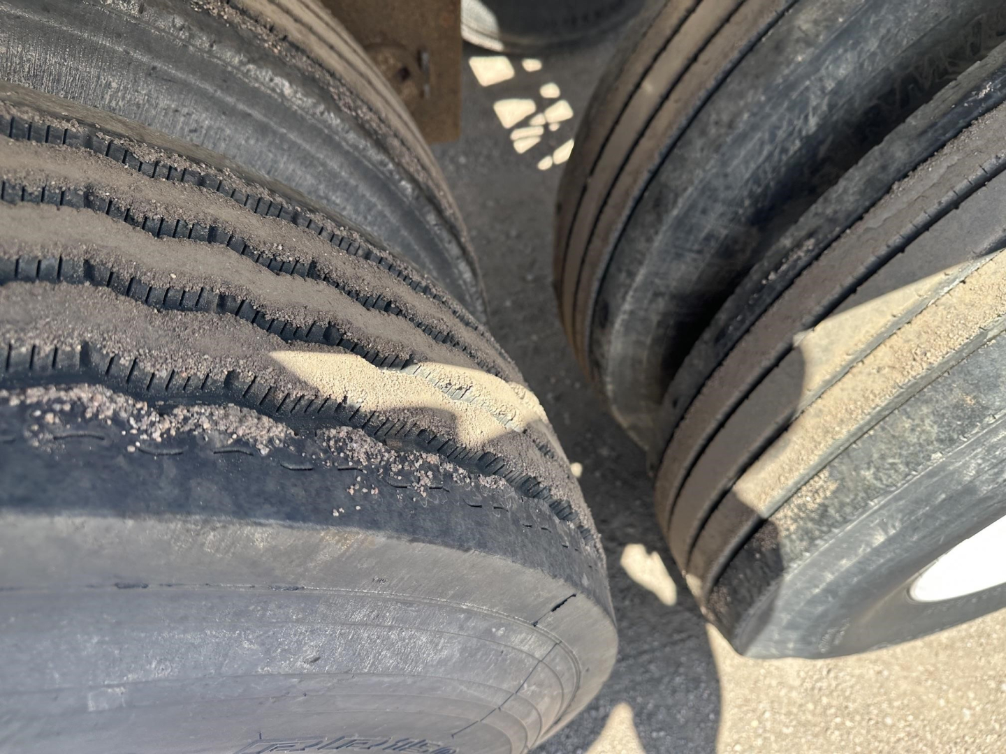 Trailer tire sidewalls with tread wear from a 2012 Polar Gravity Drop Pneumatic trailer.