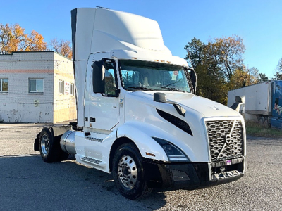 2019 Volvo VNR 300 conventional daycab truck in white, front-left view. Text on image includes VIN 4V4N39EG4KN212739, Stock Number 556540, Category Conventional Daycab, Type Trucks, NewUsed Used.
