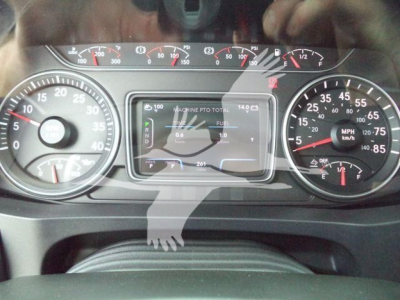Dashboard of 2027 International MV showing gauges and digital display with Engine Total and Fuel info.