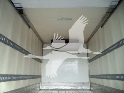 Truck interior cargo area of a 2020 Hino 195 refrigerated truck showing empty cargo space with E-rail tracks along the sides.