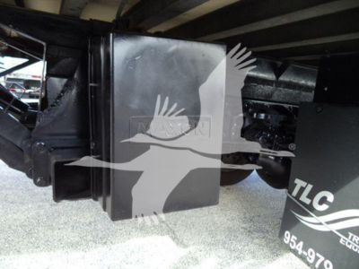 Truck hitch area of a 2020 Hino 195 refrigerated truck showing a black metal hitch mount and rear undercarriage components.