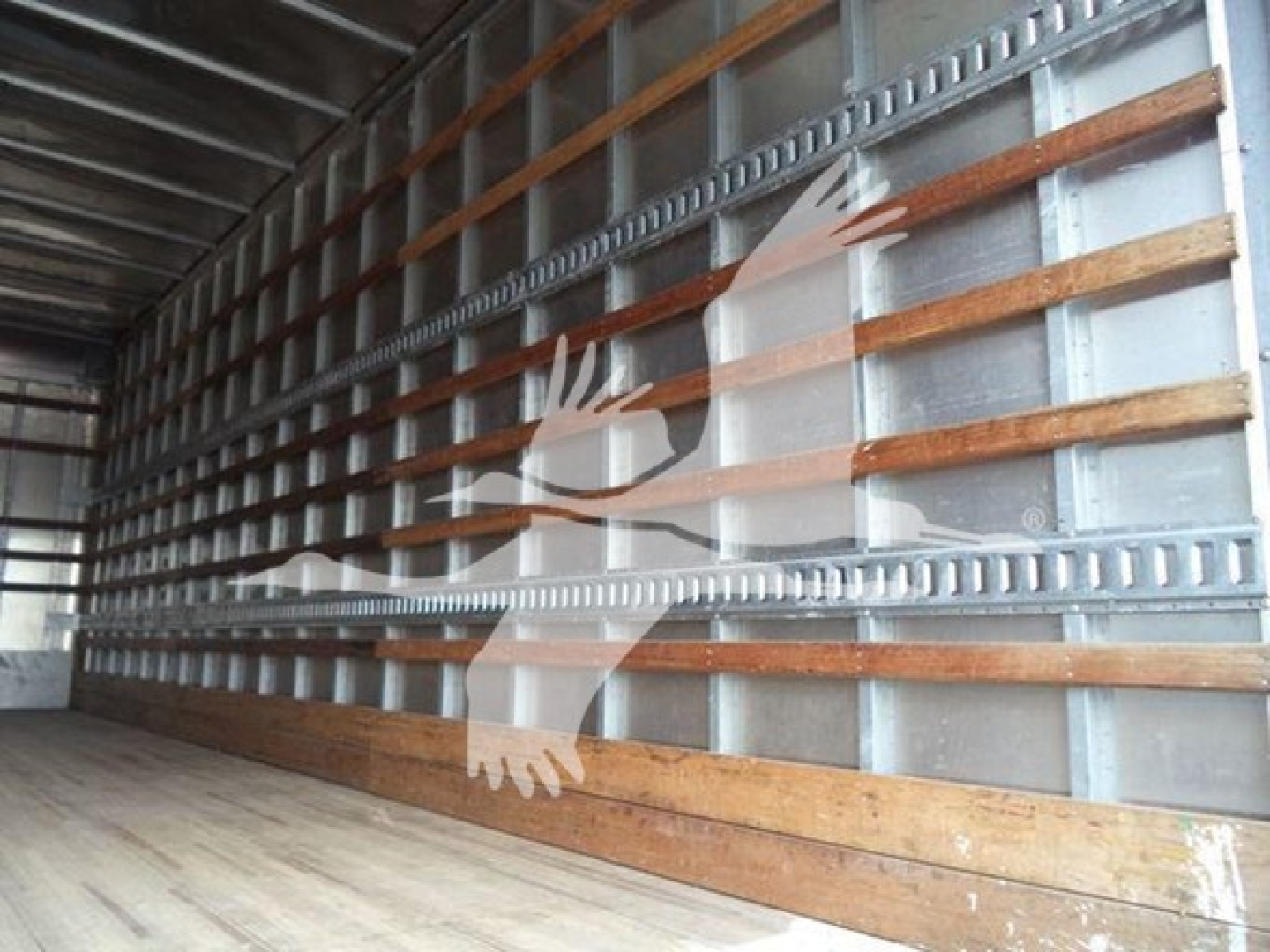 Freightliner M2 106 truck box trailer interior with wooden floor and metal side walls