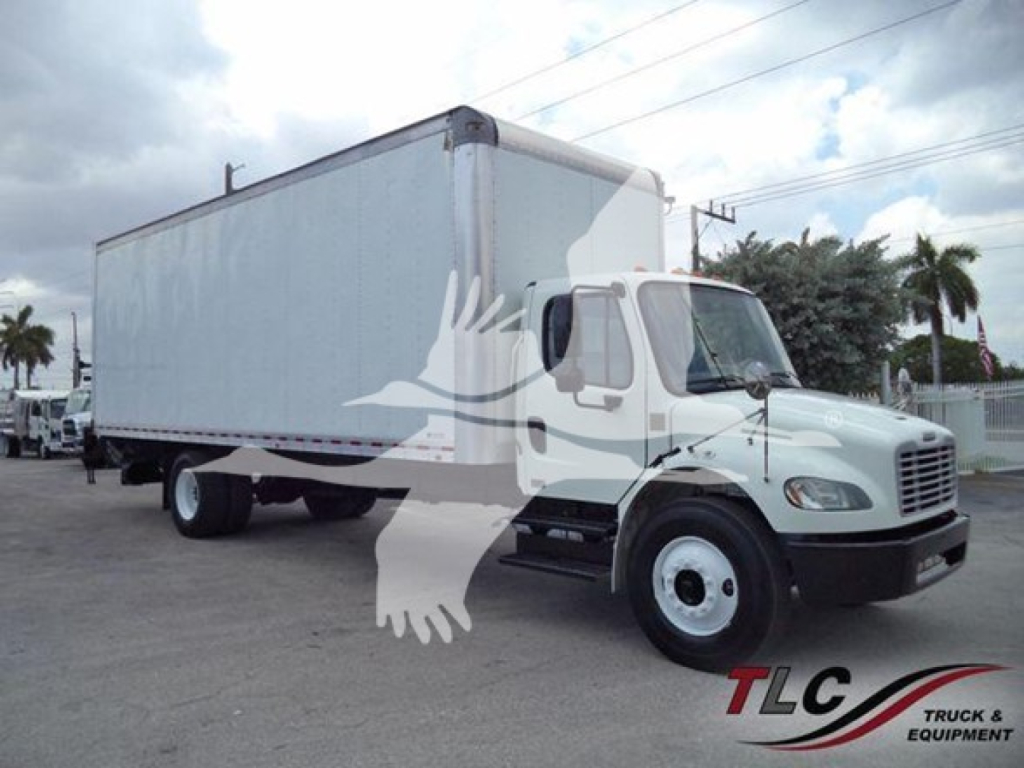 Freightliner M2 106 box truck showing cab and long cargo box with stock TD3456 on lot.
