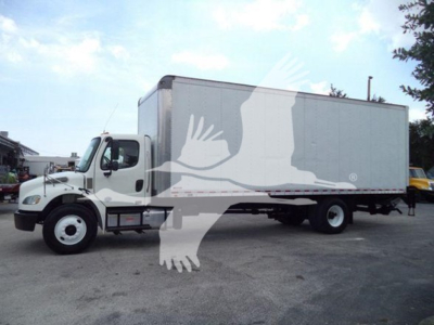 Freightliner M2 106 box truck in profile showing cab and large box with no visible text.