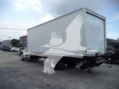 Freightliner M2 106 box truck rear and right side view showing box cargo body and rear bumper.