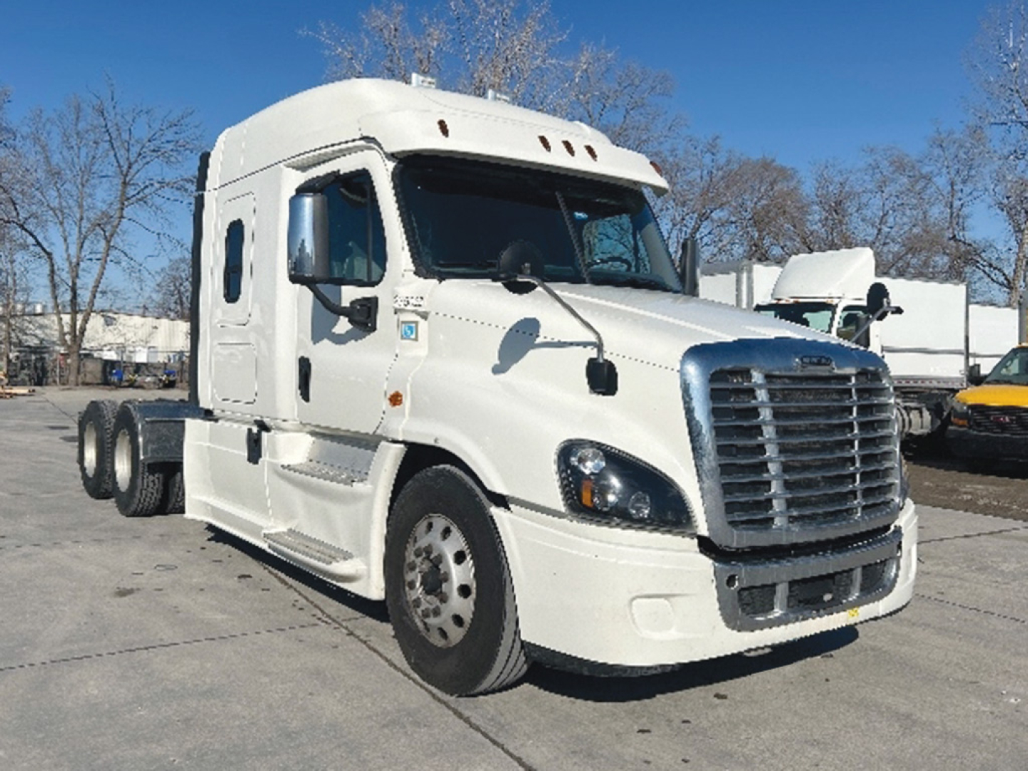 Truck cab Seattle Freightliner Cascadia 125 daylight white with sleeper, front grille, headlights, and side mirrors visible.
