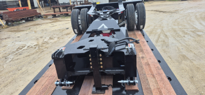 Trailer deck showing Alpha ANSB1 Nitro Spreader Bar assembly with 55-ton capacity and 8'6" width, rear wheels and hitch mounting points.