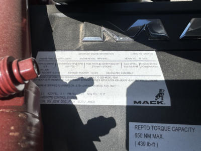 Mack truck engine bay label showing specs including REpto torque capacity 650 Nm max (439 lb-ft) and Mack logo.
