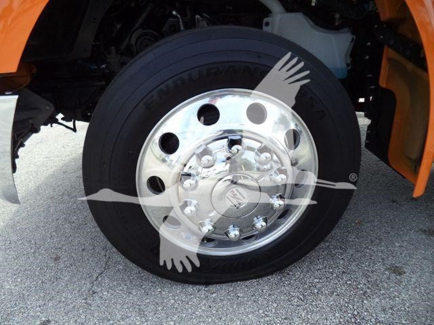Kenworth T280 wheel with large chrome hub and black tire; visible sticker/brand on wheel hub.