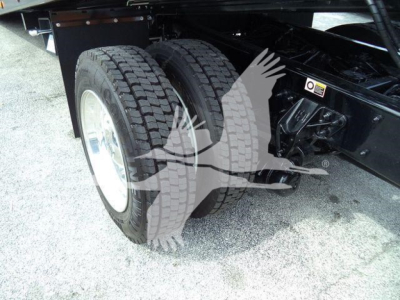 Kenworth T280 rollback truck rear dual wheels and suspension view showing tires and undercarriage label