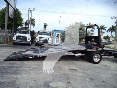 Kenworth T280 rollback truck with flatbed trailer, stock number T280ORANGE22XLP, orange color, in a dealership lot.