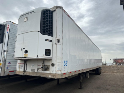 Great Dane roll door reefer trailer showing Thermo King unit on front, white exterior, 53' length, side rails, landing gear, and elevated refrigeration unit.