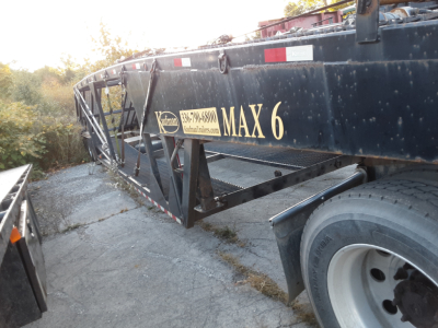 Kaufman MAX 6 car trailer showing MAX 6 branding and wheel, side profile