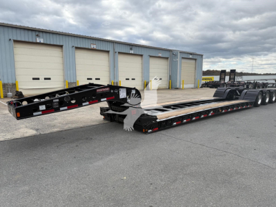  Fontaine 55Lcc W lowboy trailer showing ramp section and deck with multiple axles; visible labels include Fontaine branding and cycling components.