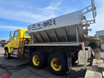 Western Star 4700 SF dump truck with wing undercarriage showing side view and dump bed