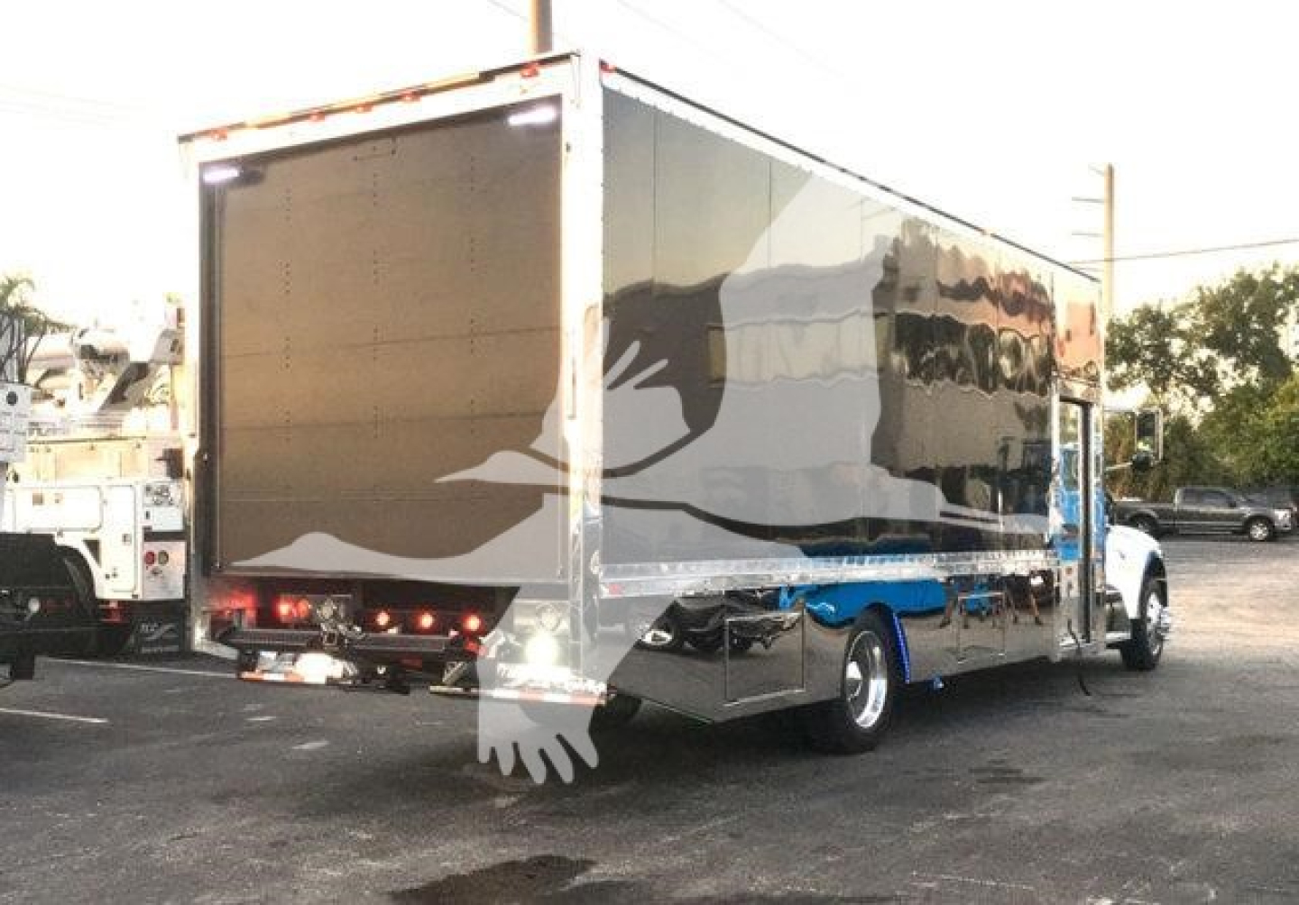 2022 Peterbilt 337 rollback truck rear and side view showing cargo box and rear lights
