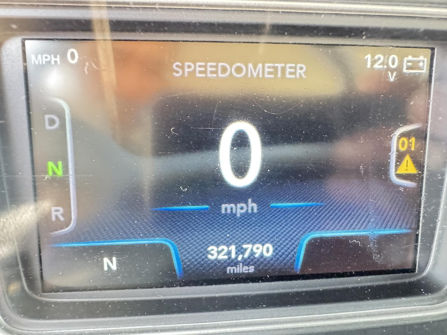 Truck dashboard display showing speedometer at 0 mph, gear indicators D N R, and odometer 321,790 miles.