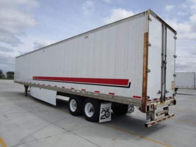 2014 Stoughton van trailer showing side and rear with red stripe graphics and dual rear wheels.