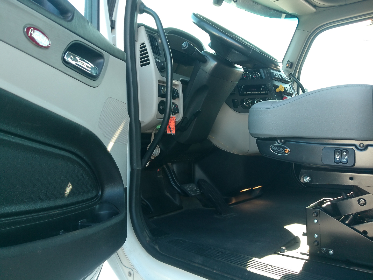 Peterbilt 579 cab interior showing steering wheel and dashboard