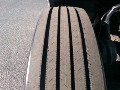 Rear drive tire tread close-up on a Peterbilt 579 truck.