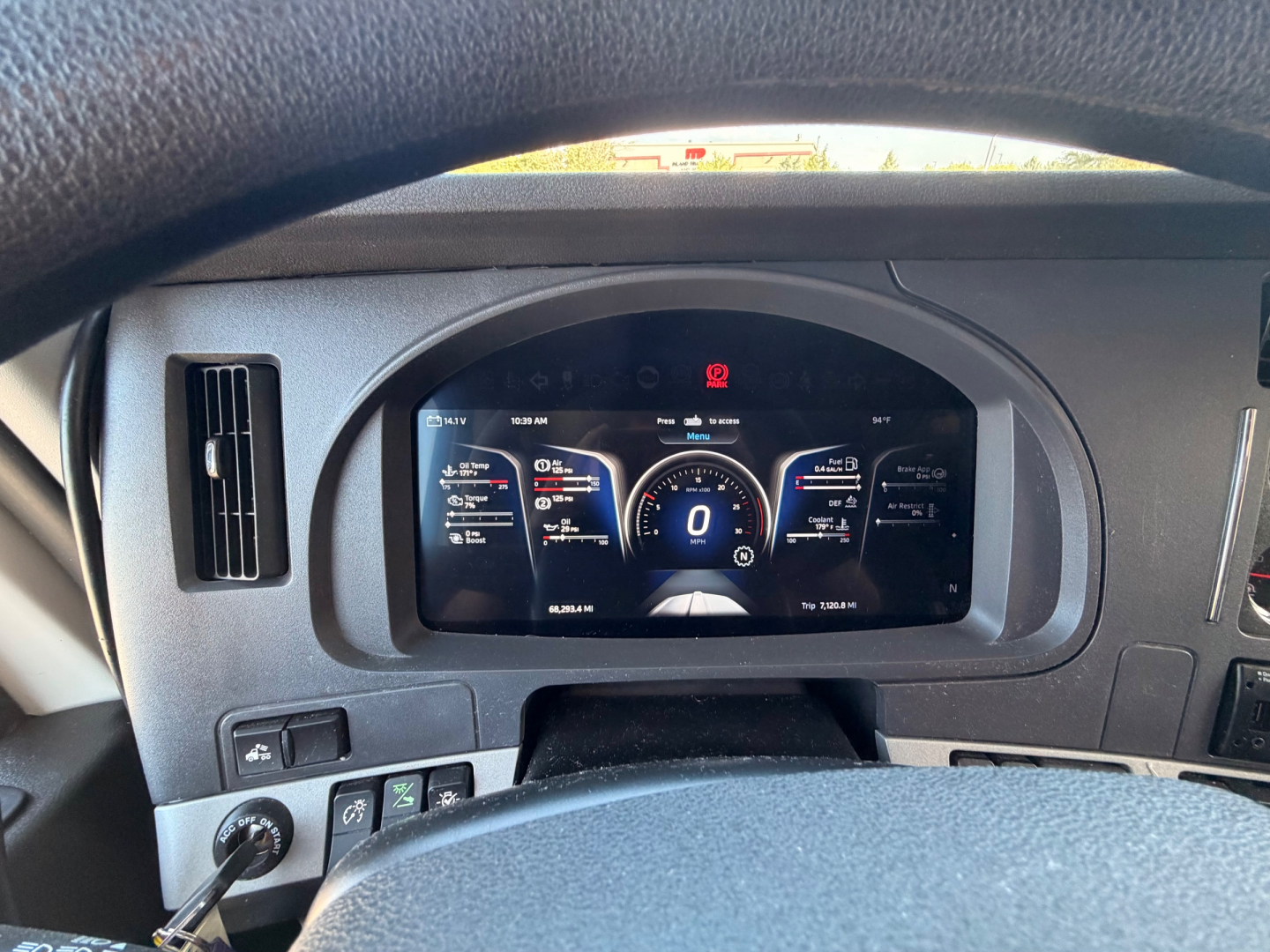 Kenworth T680 dashboard display showing digital gauge cluster with speedometer and various indicators.