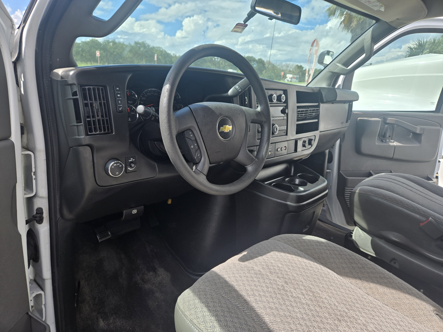 Chevrolet Express 3500 interior dash view showing steering wheel and instrument cluster
