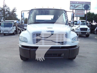 Front view of a white 2019 Freightliner M2 106 rollback truck with grille, bumper, and side mirrors visible.