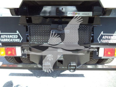 Isuzu FTR rear view showing hitch receiver, bumper, and plate area with diamond plate panels and stock labeling.