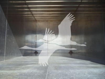 Isuzu FTR truck cargo area with branding showing large bird silhouette in trailer interior
