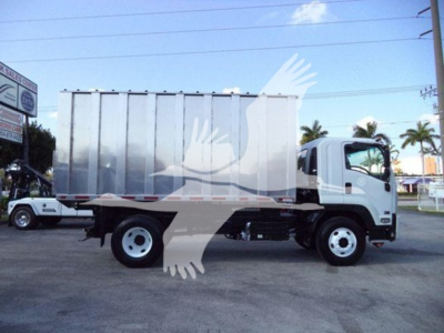 Isuzu FTR truck in side view showing cargo box and cab with white and gray colors.