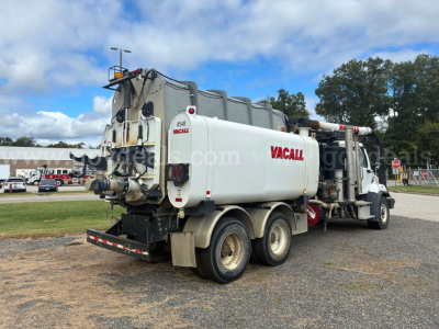 Vacall vacuum truck 2015 Freightliner 108SD rear view showing white tank with Vacall logo and hoses