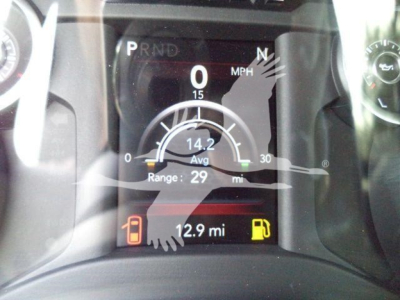 Dashboard display of a Ram 4500 showing 0 mph, 14.2 avg, range 29 mi, fuel gauge icons, and 12.9 mi trip. PRND indicators visible.