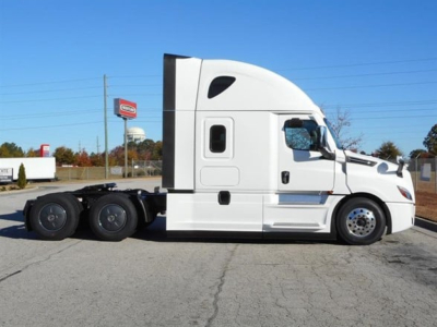 Freightliner Cascadia 126 tractor-trailer side profile showing sleeper cab and rear axles.