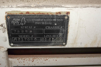 Identification plate on 1999 Ottawa 30 showing serial number 78989, model M217080, line set 01/12/99, chassis blank, customer satisfaction tag.
