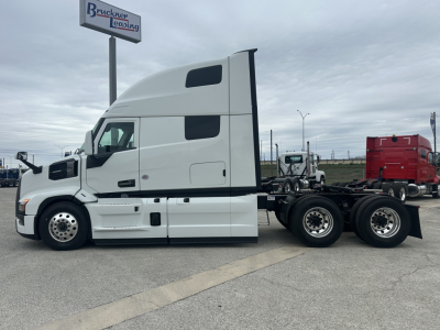 Mack PR64T76H tractor unit side view showing sleeper cab and rear wheel configuration.